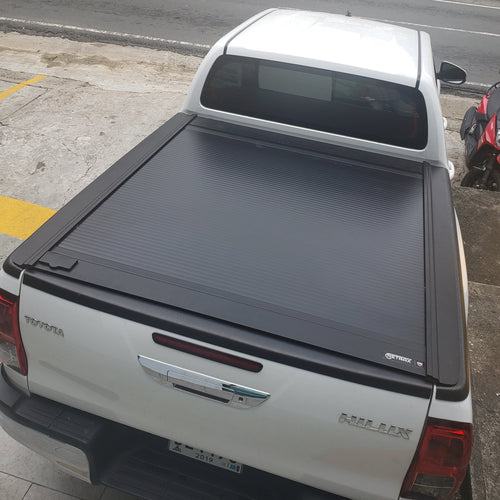 Cobertor para vagón de pickup RetraxOne MX para Toyota Hilux Revo Doble Cabina 2016+