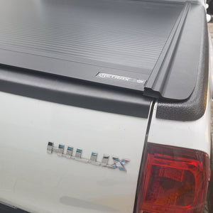 Cobertor para vagón de pickup RetraxOne MX para Toyota Hilux Revo Doble Cabina 2016+